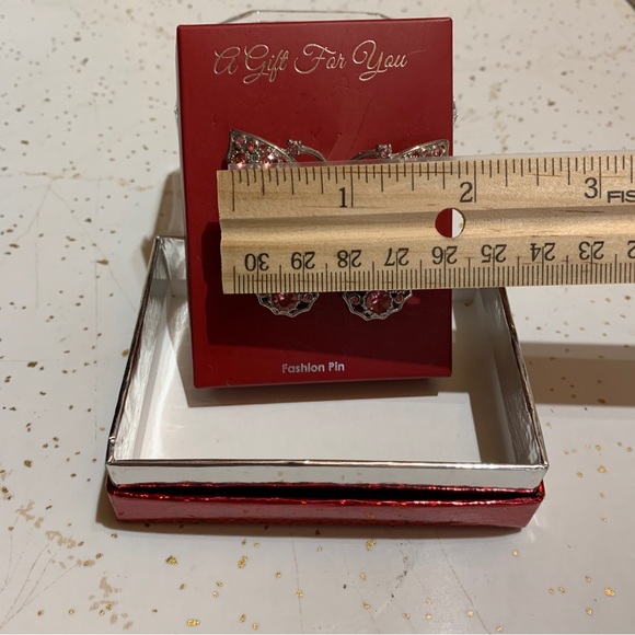 Silver Toned Pink Rhinestone Butterfly Pin. About 2” wide and 1 1/2” tall. - Picture 6 of 6